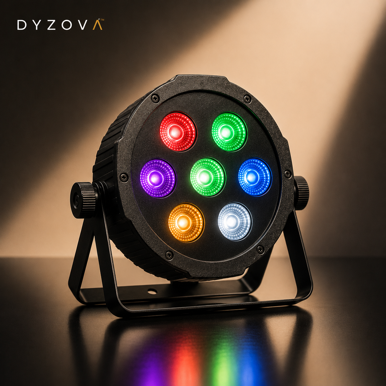 A DYZOVA 7-color LED party light stage spotlight on a black metal stand, showcasing its seven illuminated color lenses in red, green, purple, blue, orange, and white against a warm, spotlight-lit background.