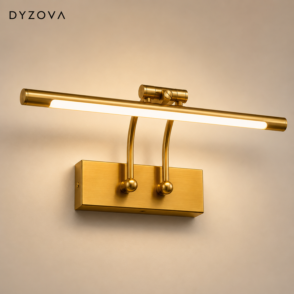 A modern wall-mounted light fixture by DYZOVA, featuring a horizontal bar with a glowing LED light tube and two curved gold metal arms attached to a rectangular gold wall plate, shown against a plain beige wall.