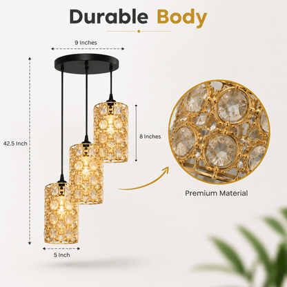 Three-tier gold and crystal pendant light fixture with dimension annotations showing 42.5-inch height, 9-inch canopy width, 8-inch shade width, and 5-inch shade depth, alongside a circular close-up of the crystal material.