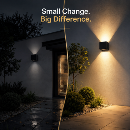 Two modern black outdoor wall sconces mounted on a house exterior at night, casting warm light beams onto the wall and walkway. The left sconce is off-center to the left, and the right sconce is centered to the right, with a diagonal split line dividing the composition.