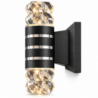 Cylindrical Outdoor Wall Sconce with Warm Up Down Lighting