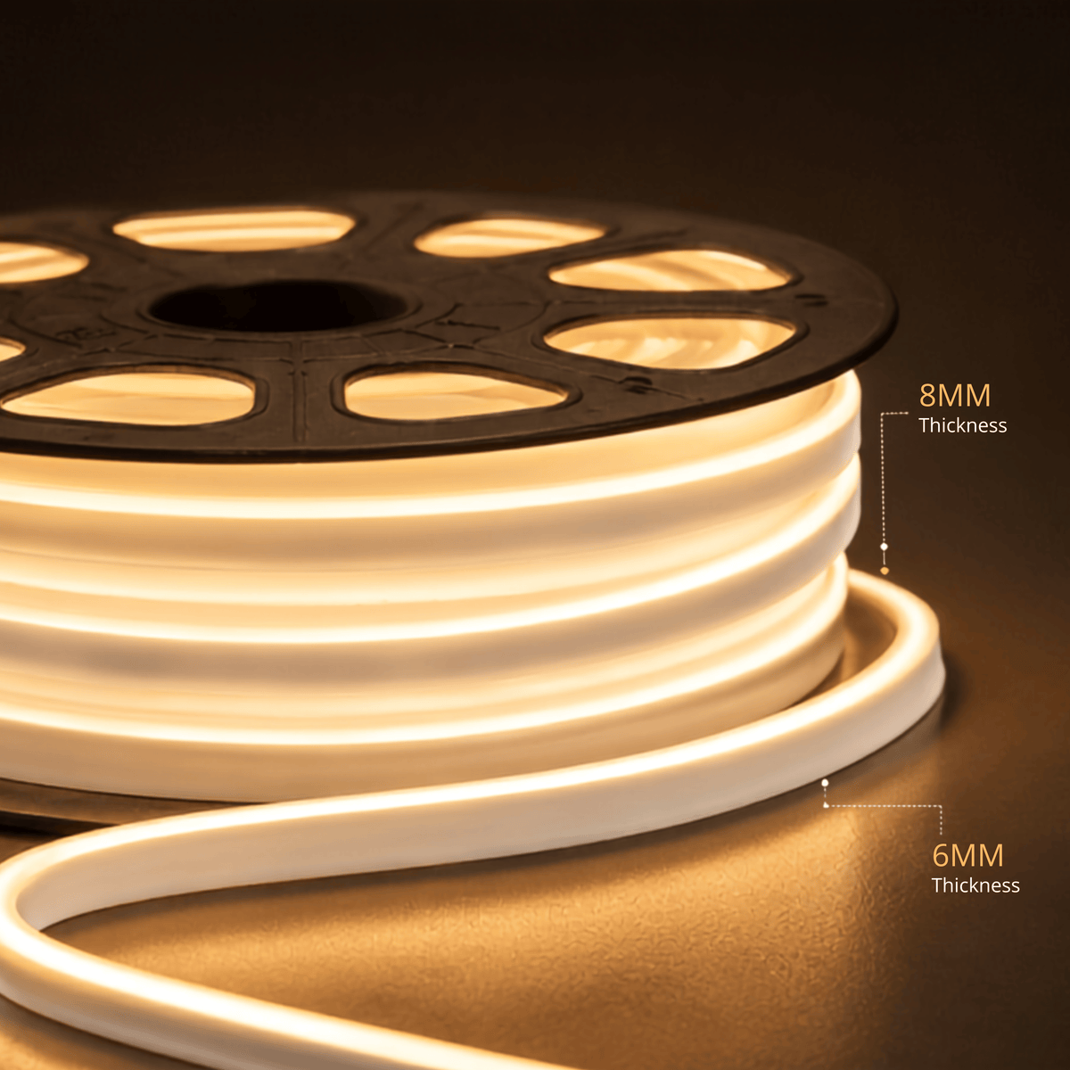 A close-up of a coiled warm white LED light strip on a black spool, with overlaid text labels showing 8MM and 6MM thickness against a dark background.