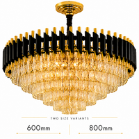 A large circular chandelier with a gold and black frame and clear crystal drops, shown against a white background with dimension labels indicating two size variants: 600mm and 800mm.