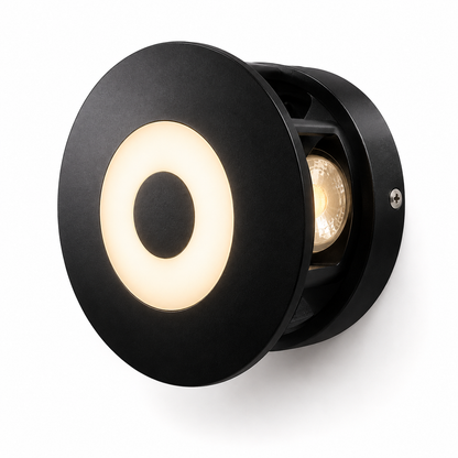 A modern black outdoor wall light fixture with a circular face, featuring a glowing warm white ring and a visible LED bulb inside, set against a plain white background.